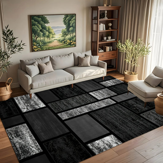 Modern patchwork area rug, geometric tile abstract pattern floor mat, minimalist black and gray home decor carpet, suitable for living rooms, bedrooms, studies, and indoor apartment interiors